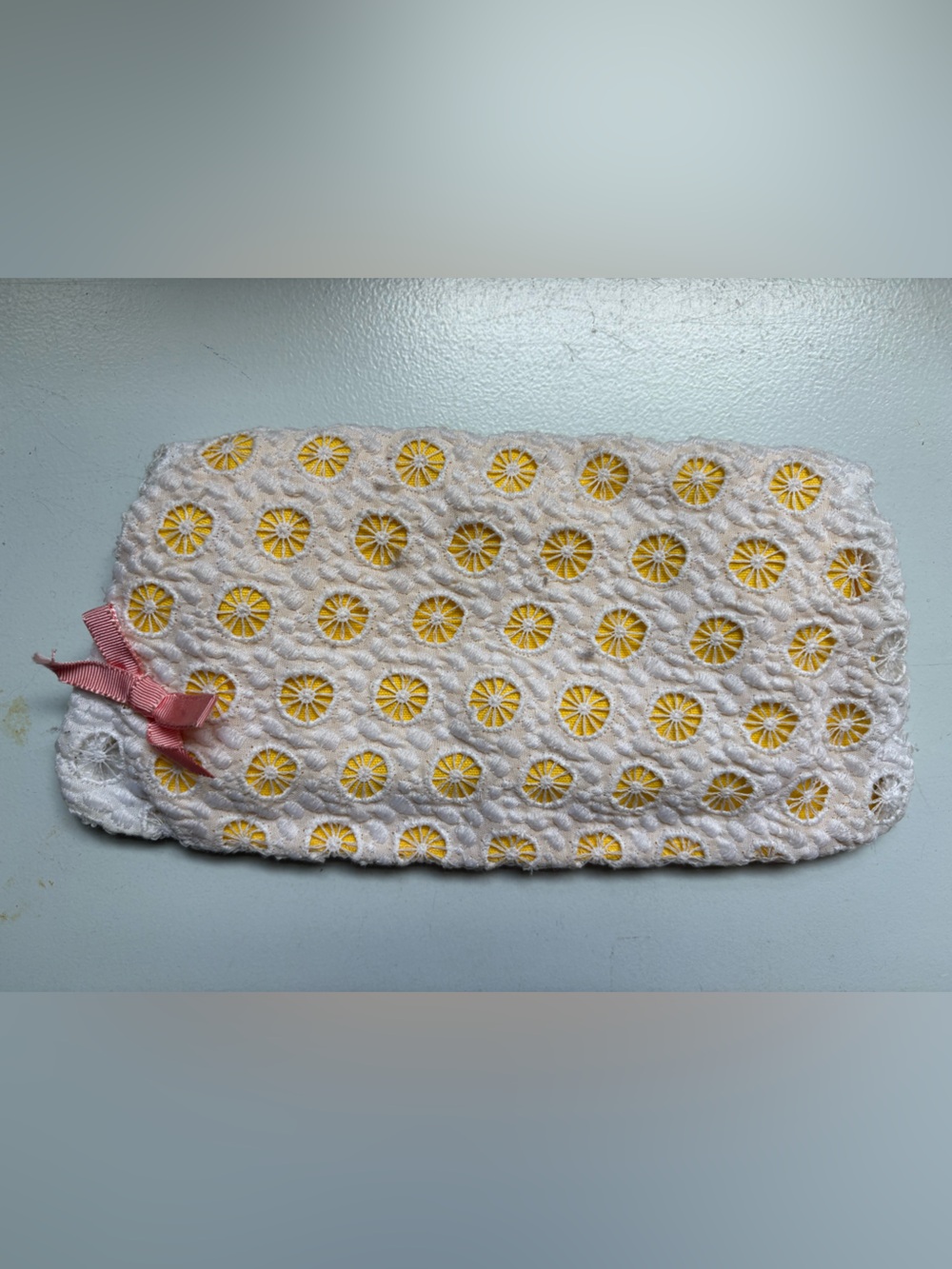 Anthropologie White and Yellow Eyelet Clutch with Pink Bow